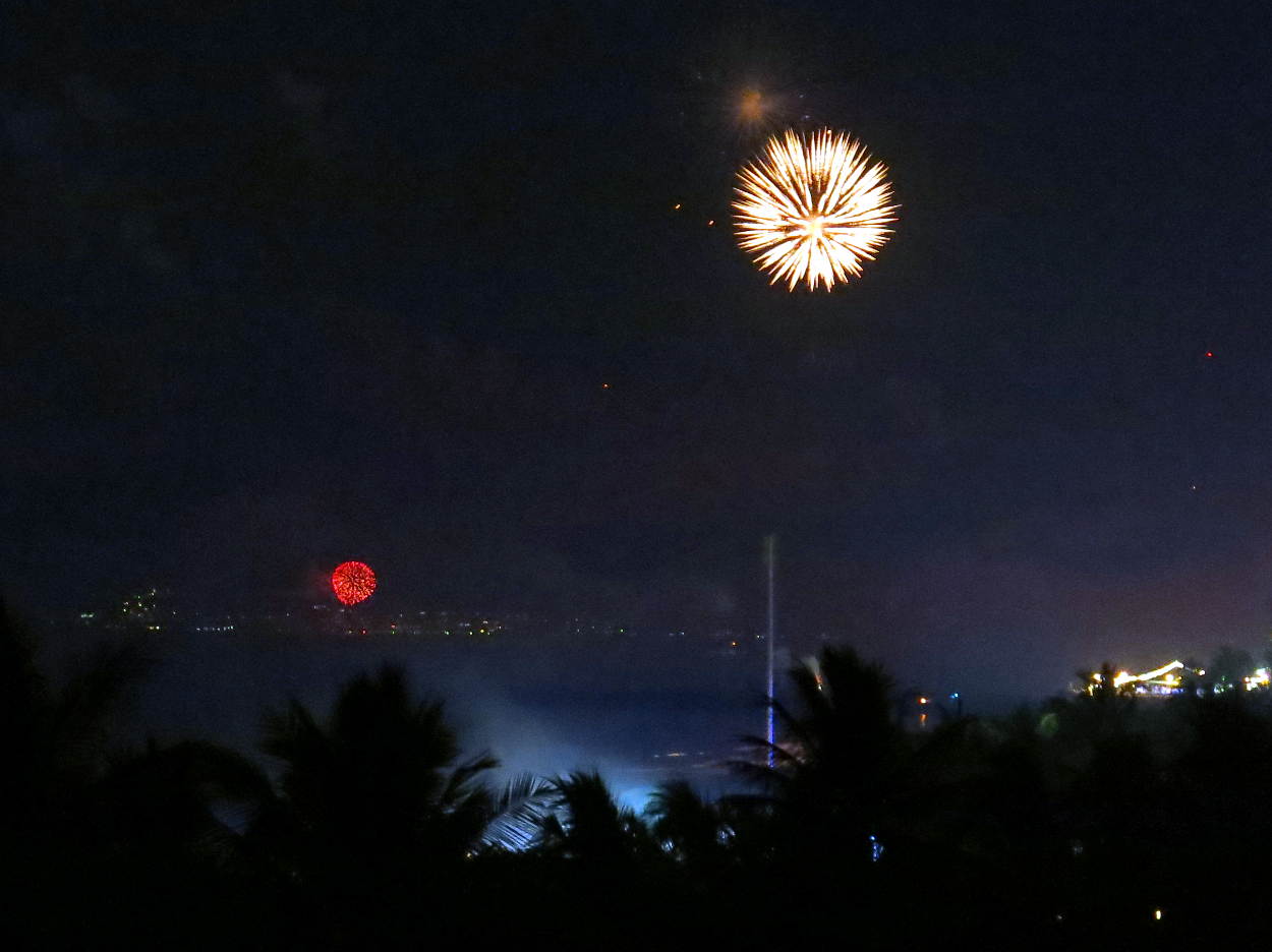 Looking north, we can see fireworks displays from many properties.