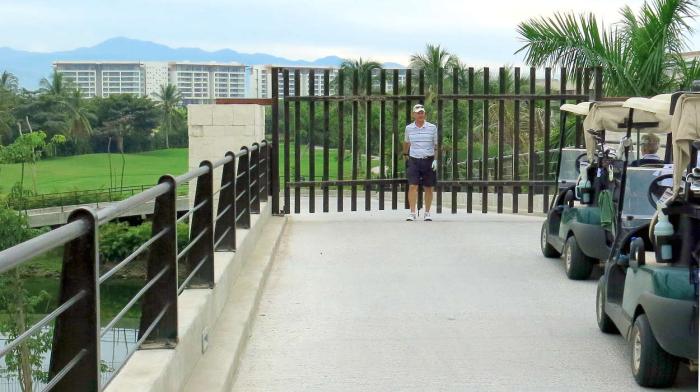 This is on the Golf Cart Bridge looking west of Blvd. Nayarit.  The bridge is open to golf cart traffic during the day.  The gate has been locked after the last golfer finishes playing the east side.  Use caution when using this bridge to walk to restaurants near the Marina. Taxi home at night.