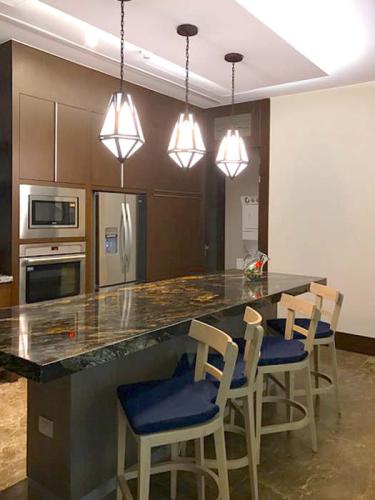 Residence at the Grand Luxxe - Living and Kitchen Area.