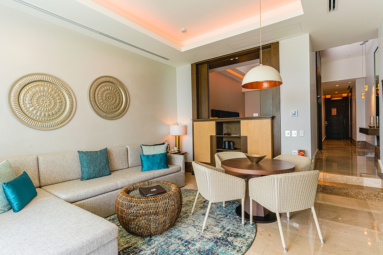 The Living and Dining Area of the Luxxe Royal 1 BR unit in Tower Six at the Grand Luxxe Residence Club in Nuevo Vallarta, Mexico