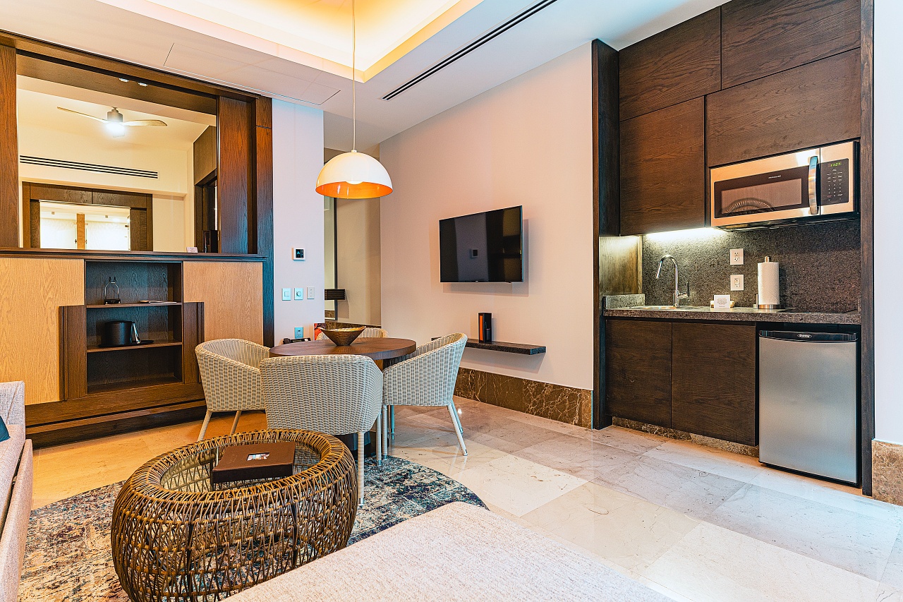 The Living and Dining Area of the Luxxe Royal 1 BR unit in Tower Six at the Grand Luxxe Residence Club in Nuevo Vallarta, Mexico